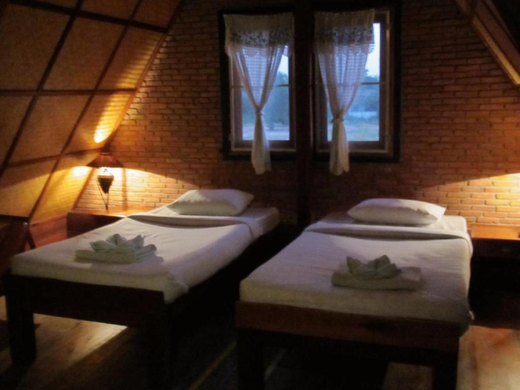 Orchid Hibiscus Guest House Сукотай Стая снимка
